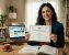 Woman holding language certificate 806416a5